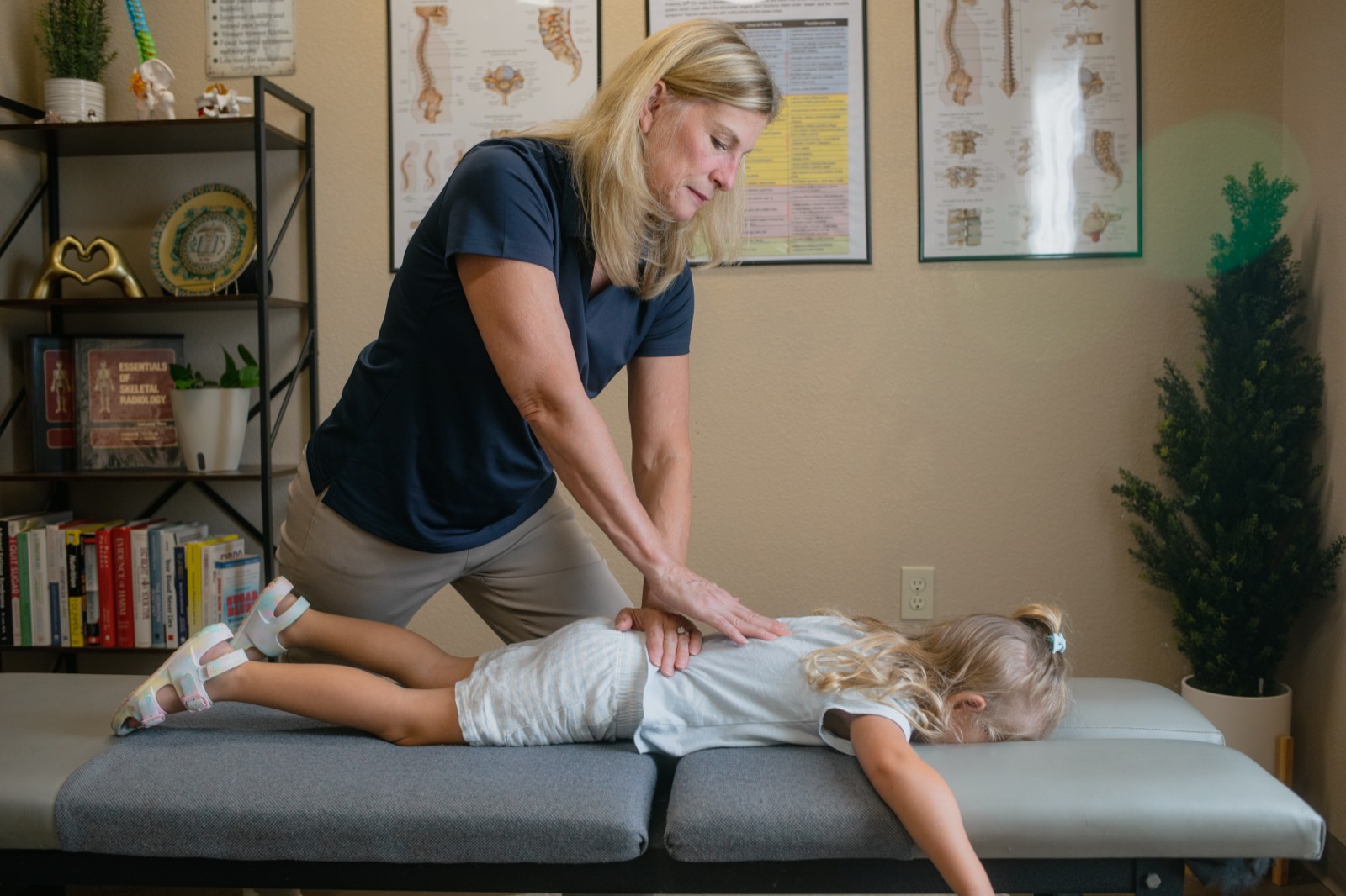 Dr. Emily providing careful, age-appropriate care for a young patient.